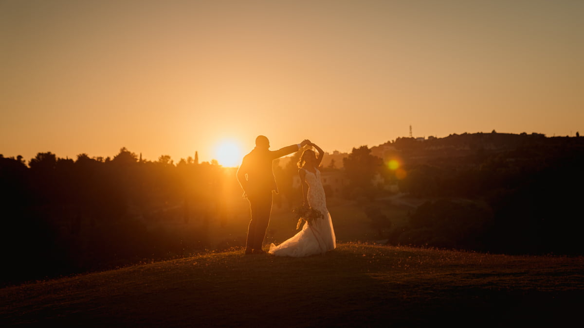 dancing in the sunset at Minthis Hills
